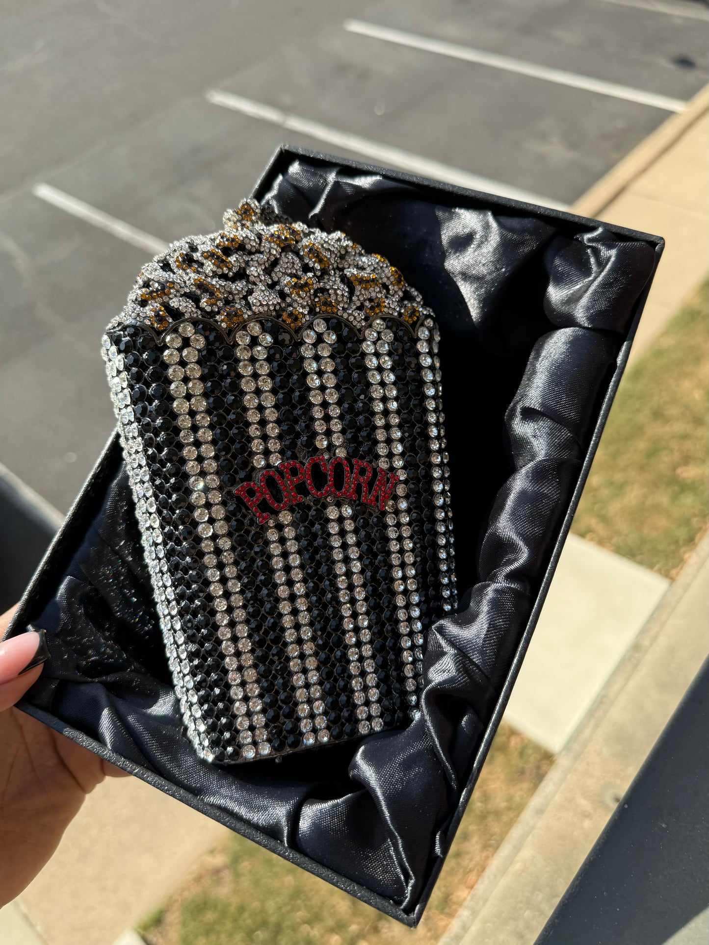 Black sparkling popcorn clutch